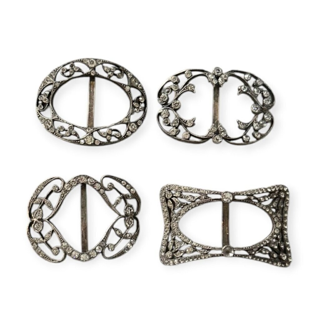 Assorted collection of antique buckles. 4 pieces